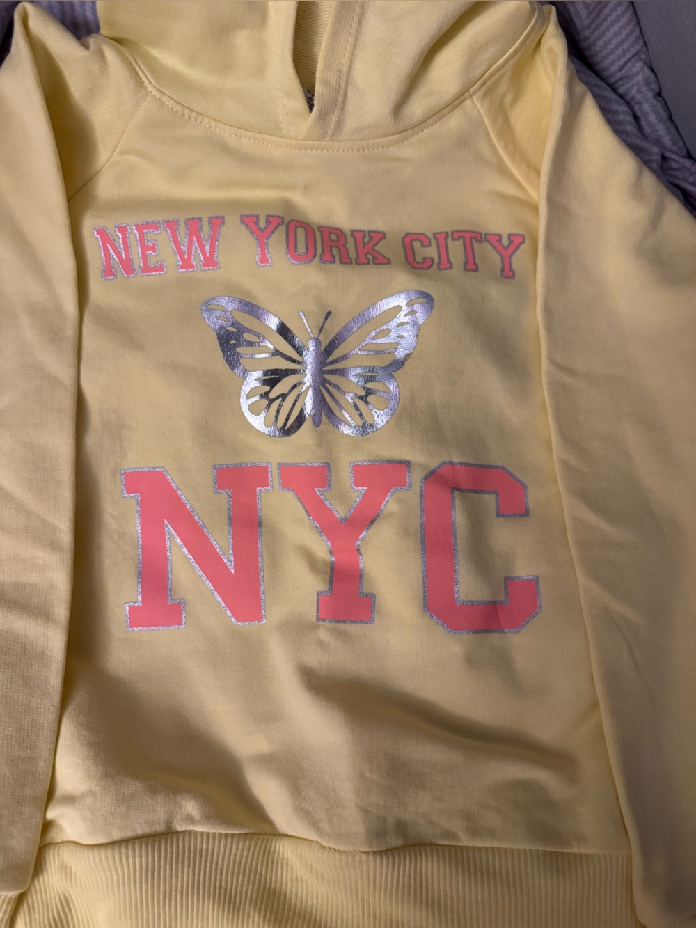 Yellow 'NYC New York City' Hoodie with Pink Letters and Silver Butterfly